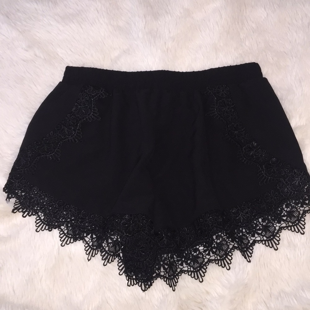 Black shorts with crochet detailing
